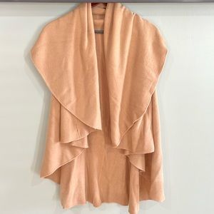 Women's Poncho. New without tags. One size 0-12.